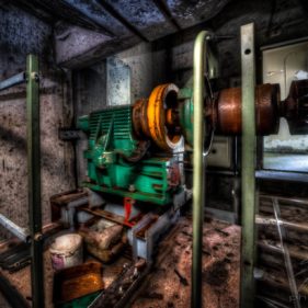 Rusty Power - An old electric motor, partially disassembled, in the Clinique Du dIable, an abandoned sanatorium / clinic / hotel in the ills of Alsace, France