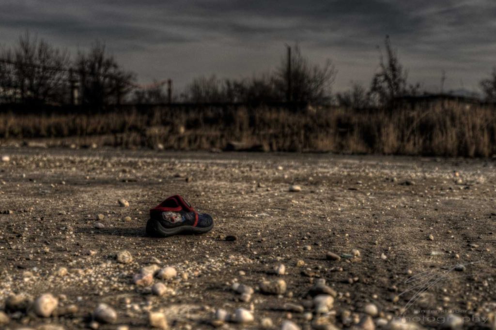Lost Shoe - A lost shoe in an old, abandoned industrial area outside Brașov, Romania